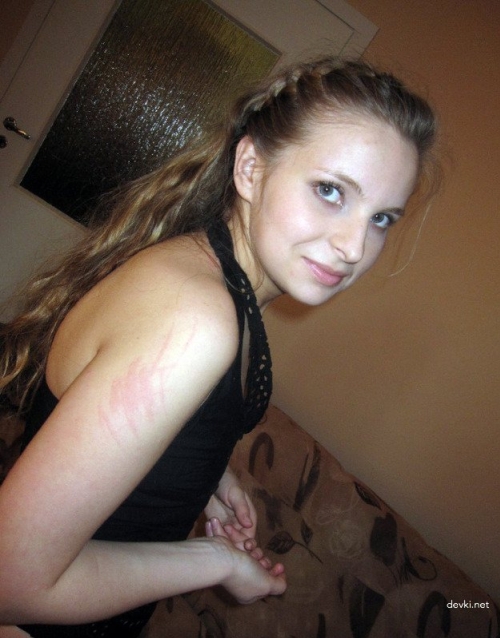 Young Nude Girl Striking Provocative Poses for Explicit Photoshoot
