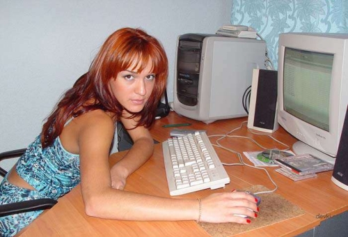 Redhead Nude Girl Poses Seductively