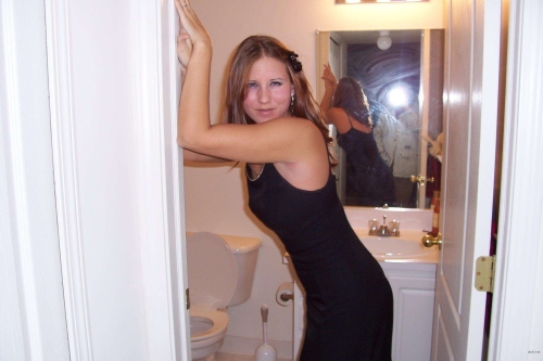 Seductive Woman in Black Dress: Explicit and Sensual Beauty