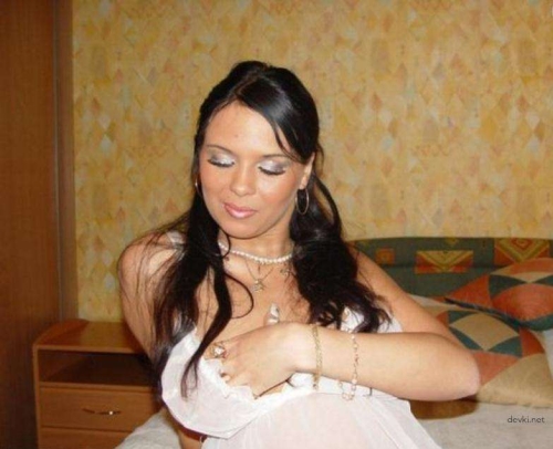 Brunette Beauty Strips Naked in White Dress - Hot XXX Photos