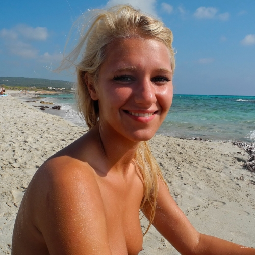 Sun-Kissed Blonde with Stunning Body: Explicit Beach Beauty