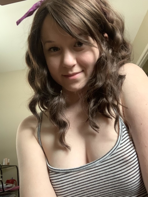 Sizzling Photos of Young Woman Showing Off Her Pussy