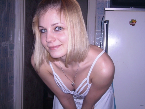 Seductive Babe Poses in Revealing Positions: Stunning Girl Shows Off Her Looks