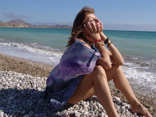 Beach Babe with Hairy Bush by the Sea: Explicit Adult Content