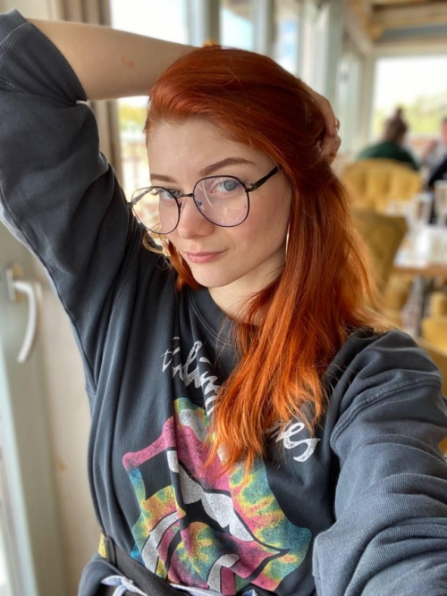 Slender Redhead Girl Shows Off Her Plump Pussy