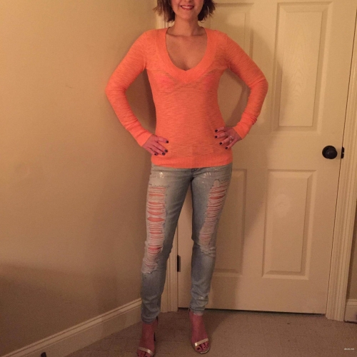 Seductive MILF strips off panties in provocative photo shoot