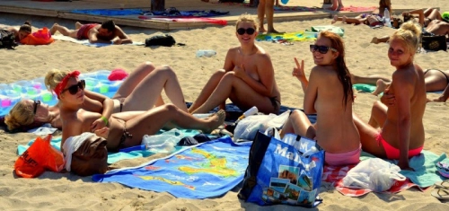 Naked Babes with Big Tits on the Beach: Explicit Busty Girls Exposed
