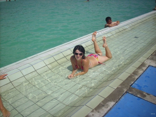 Topless Wet Girls Sunbathing: Explicit Beach Photos