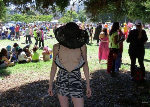 Naked Woman in Hat: Explicit Female Nude Portrait