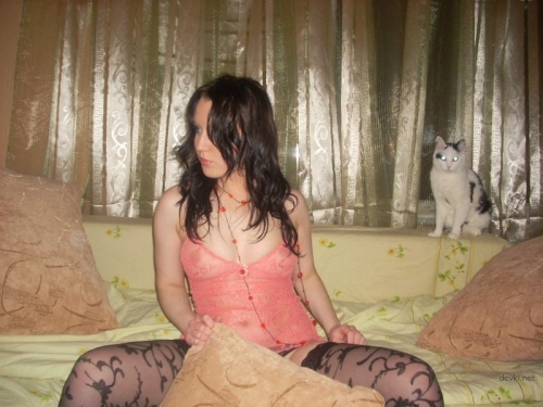 Sexy Young Woman in Stockings on Sofa - Seductive Lingerie Photoshoot