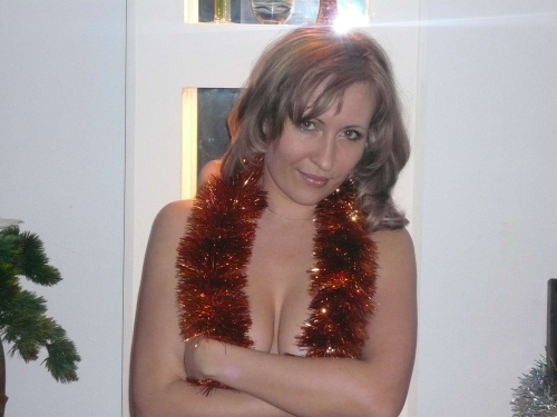 Blonde Nude Model Poses Explicitly for Photo Shoot