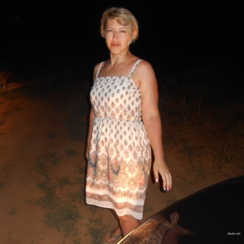 Seductive Woman's Intimate Outdoor Nude Photo - Explicit and Appetizing Shot