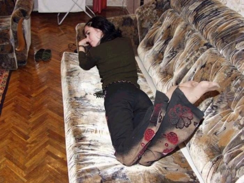 Sexy Woman Posing Seductively on Couch - Hot Photoshoot