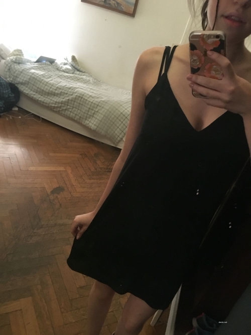 Explicit Nude Woman Standing in Front of Mirror