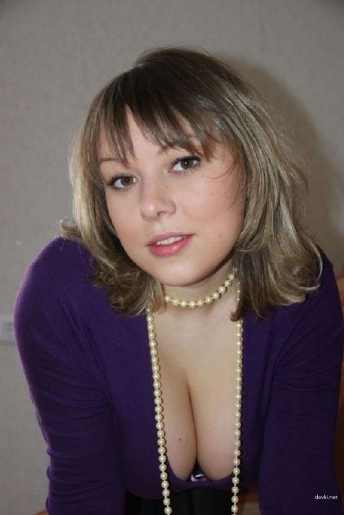 Voluptuous Busty Girl on Couch: Explicit Curves and Seductive Pose