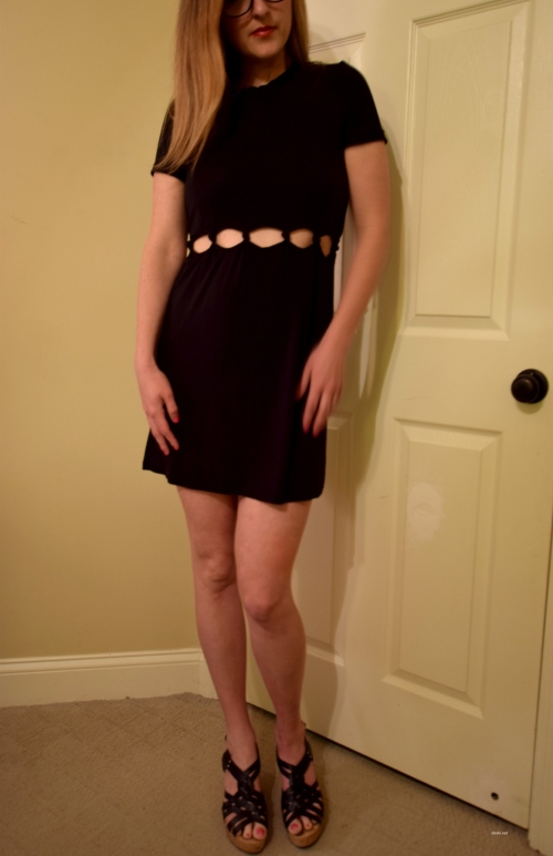Sexy Woman Posing in Short Black Dress - Sultry and Seductive Model Photo