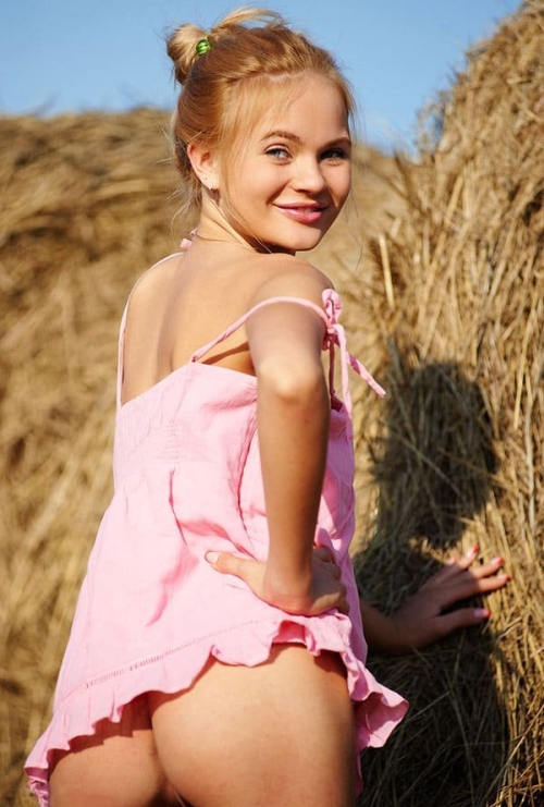 Hot Chick Photoshoot on Hay - Seductive Farm Girl Poses in Provocative Outfit