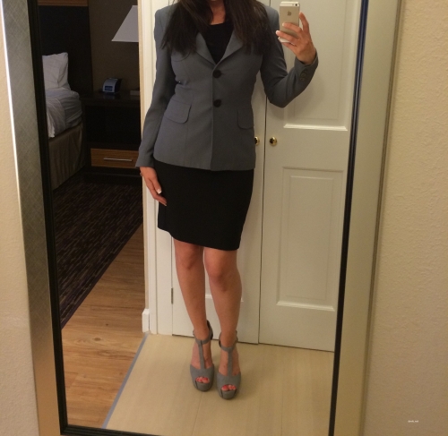 Sultry Businesswoman Poses in Sexy Suit - Seductive Office Attire Photo