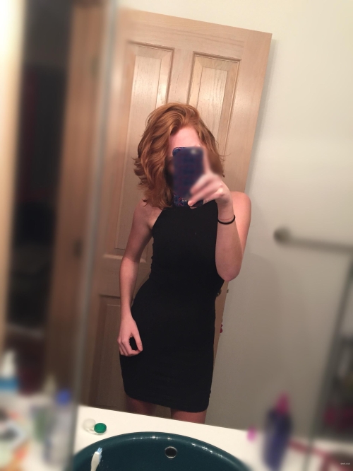 Fiery Redhead with Seductive Figure: Sensual Beauty in Lingerie