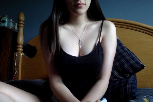 Busty Babe Strips Naked on Bed - Explicit Nude Selfie Display