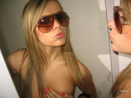 Attractive Blonde Engages in Explicit Sex - Hardcore Porn Photo