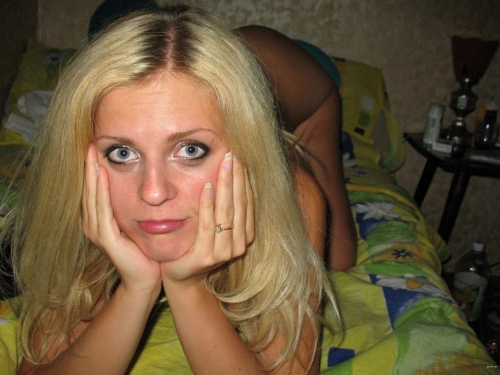 Seductive Blonde Teasing in Explicit Porn Photo