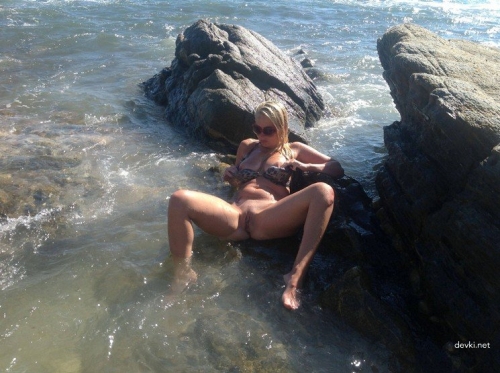 Naked Mistress at Sea: Explicit Beach Nudity for Voyeuristic Thrills