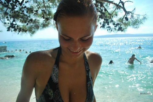 Topless Girl Sunbathing and Swimming - Bold and Explicit Beach Fun