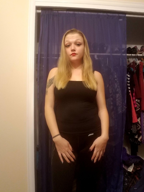 Sexy Girl with Tattoo and Nose Ring Exposing Her Body