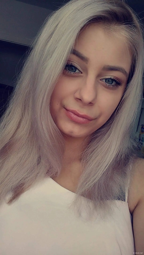 Hot Young MILF with Big Tits Exposed in Provocative Photo