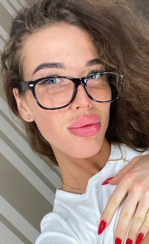 Seductive Young Woman with Plump Lips in Close-Up Shot