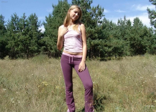 Naked Beauty on Forest Glade: Explicit Nude Woman Outdoors