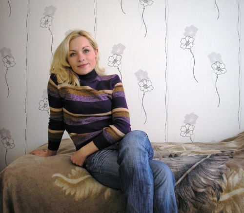 Attractive Blonde Poses in Intimate Home Photoshoot