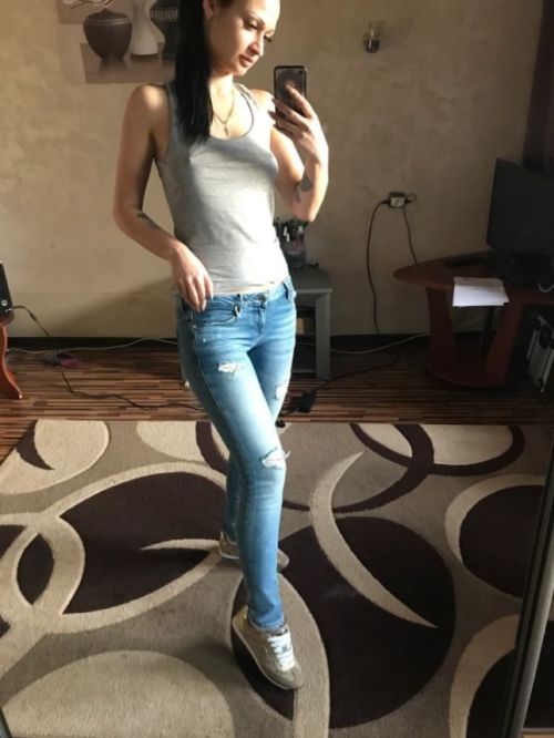 Seductive Girl Takes Erotic Selfies of Tattooed Body