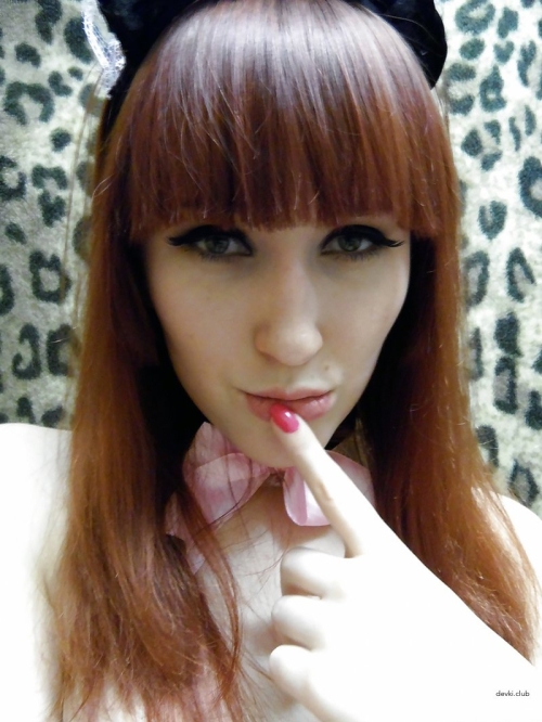 Sexy Redhead Maid in Provocative Outfit