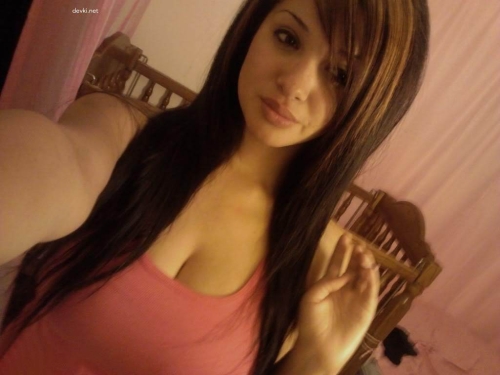 Private Photo of Busty Beauty: Explicit Image of Stunning Girl with Plump Breasts