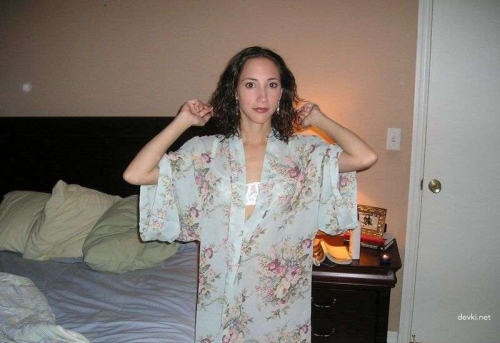 Explicit Woman Reveals Alluring Assets in Sensual Display