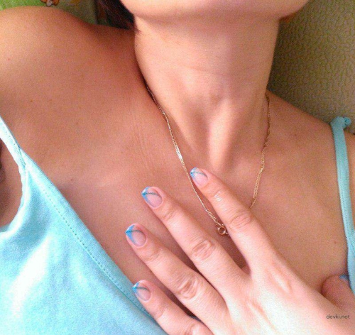 Topless Woman Flaunts Bare Breasts in Provocative Display