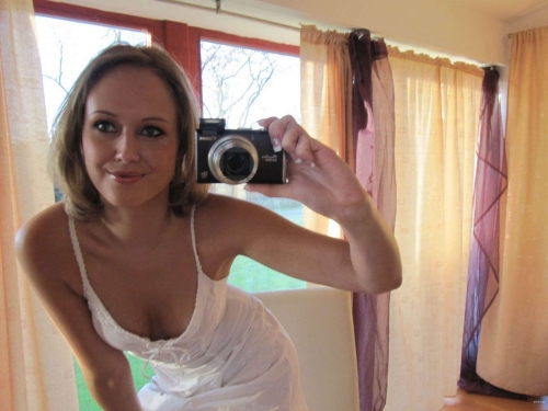 Seductive Girl Reveals Erotic Content in Bold Photoshoot