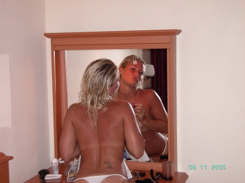 Tanned beauty sucks dick - Explicit oral sex photo