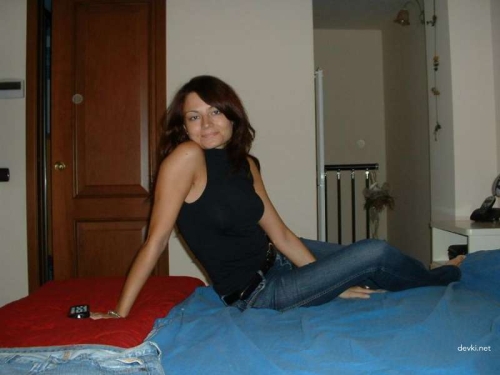 Busty Girlfriend Poses Seductively in Bed - Explicit Content
