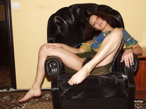 Sexy Girl Strips Naked in Chair for Erotic Photoshoot