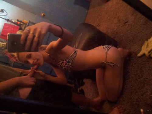 Wife Shows Pussy and Sucks Cock - Explicit Amateur Porn Photo