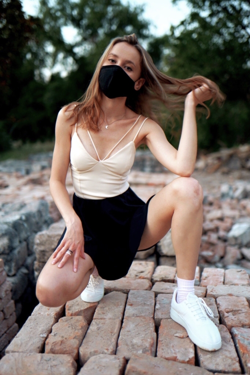 Girl in Mask and Skirt without Panties: Explicit Nude Photo