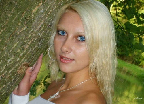 Blonde Bombshell with Stunning Eyes in Explicit Porn Photo Shoot