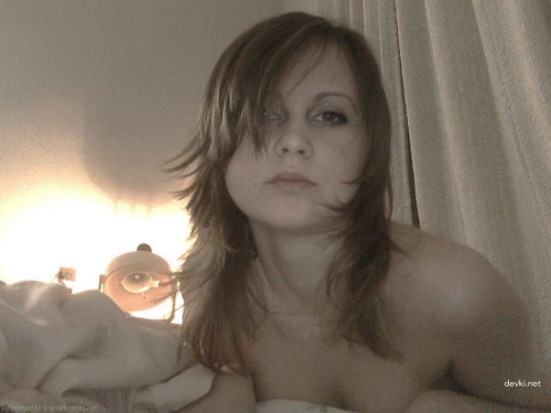 Hot babe flaunts her wet pussy - Explicit close-up photo