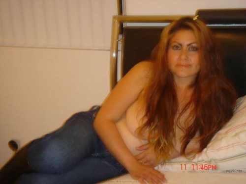 Explicit Woman Flaunts Her Assets in Revealing Display