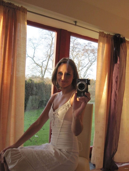 Seductive Girl Reveals Erotic Content in Bold Photoshoot
