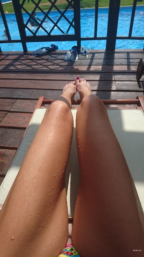 Private Vacation Photo: Explicit Beach Fun and Nudity Shot
