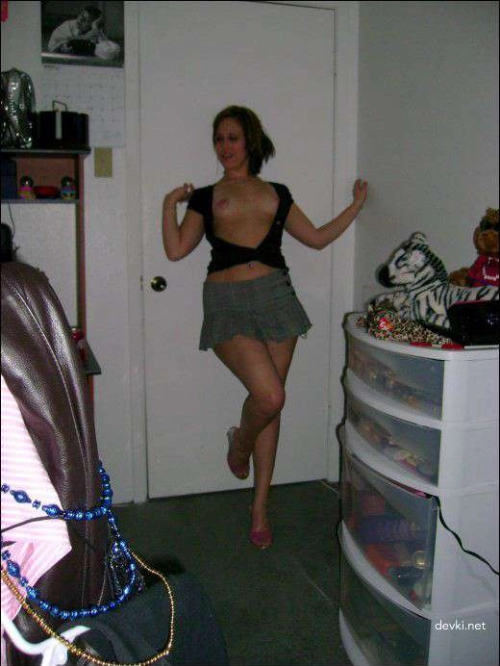 Naked Brunette in Gray Skirt: Explicit and Sensual Photoshoot